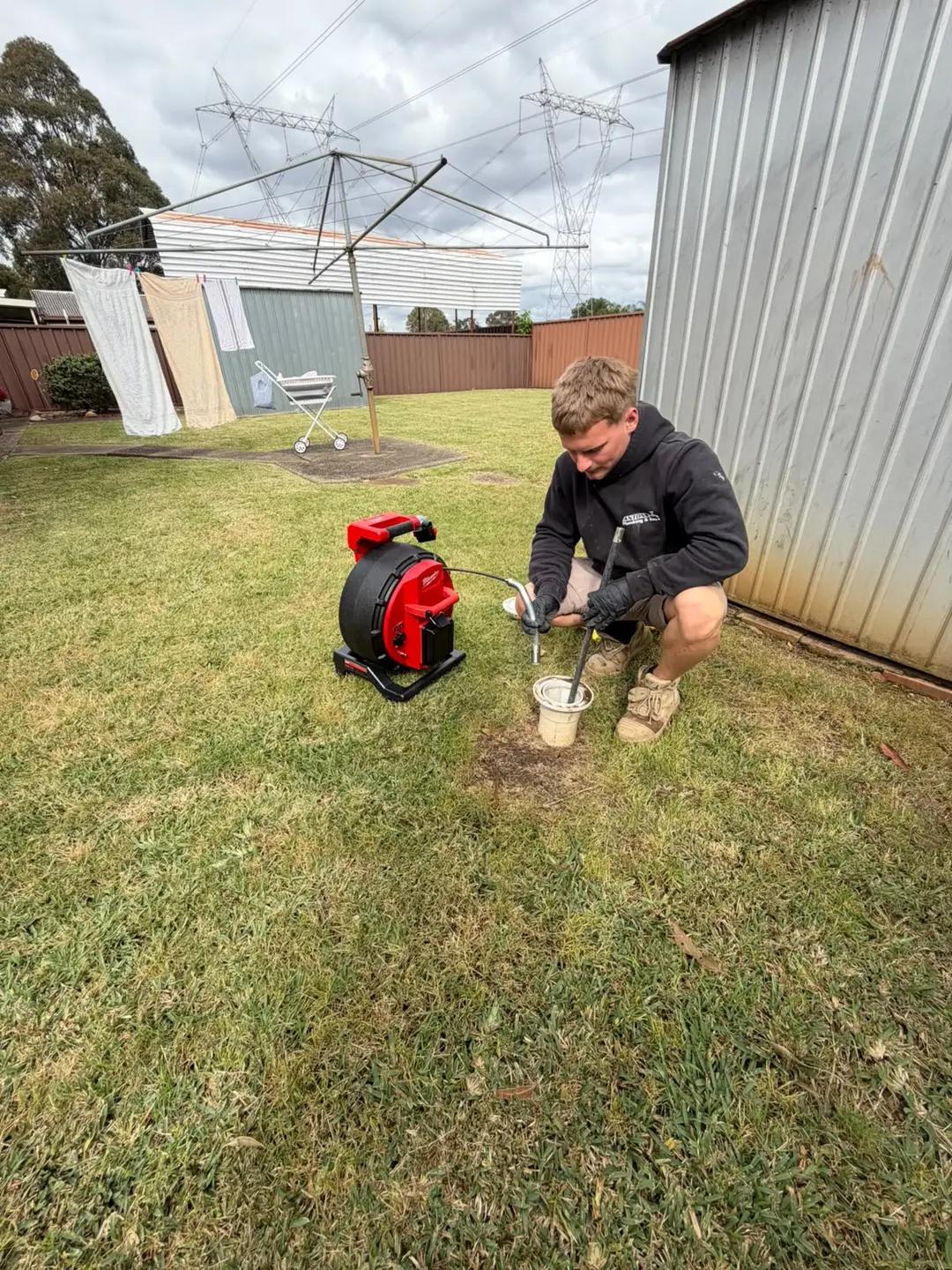Antons plumber preparing a professional CCTV drain camera and locator