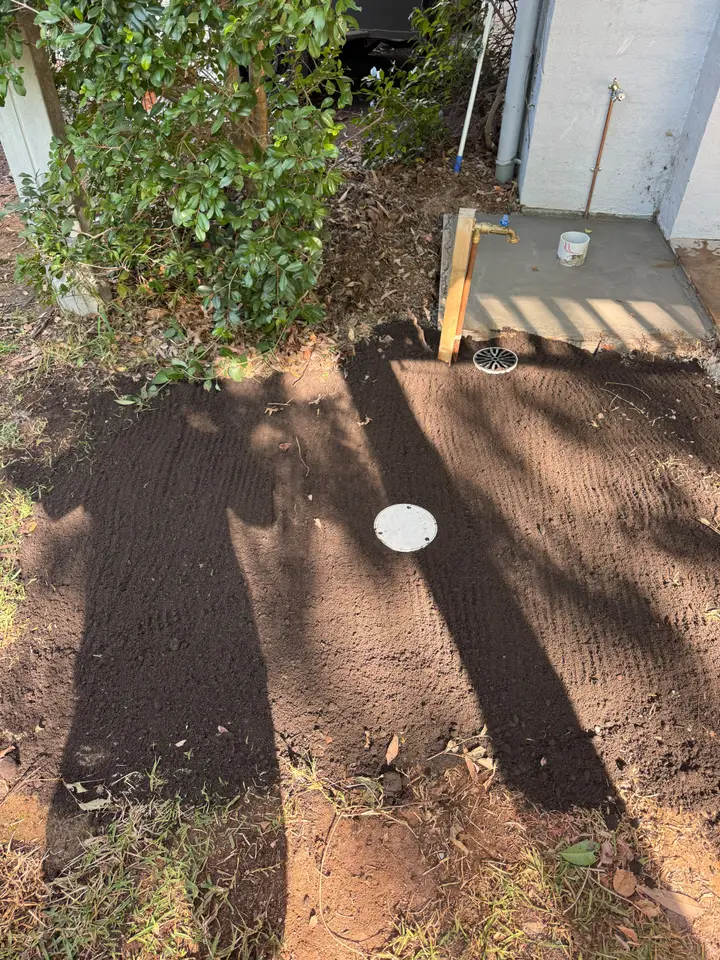 Finished yard after an underground drain repair was backfilled